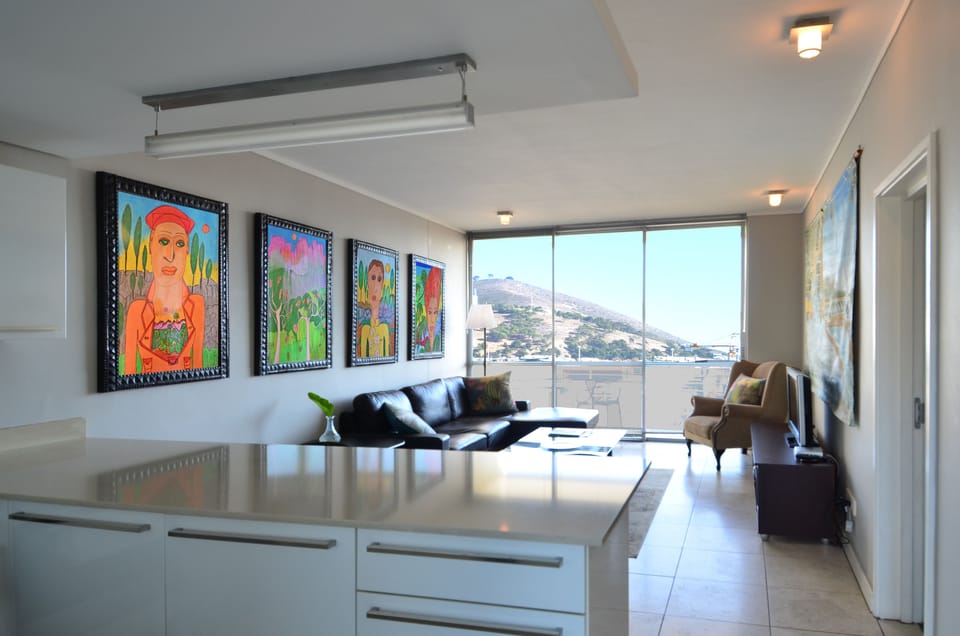 Deluxe Apartment, Canal View | Living area | Flat-screen TV