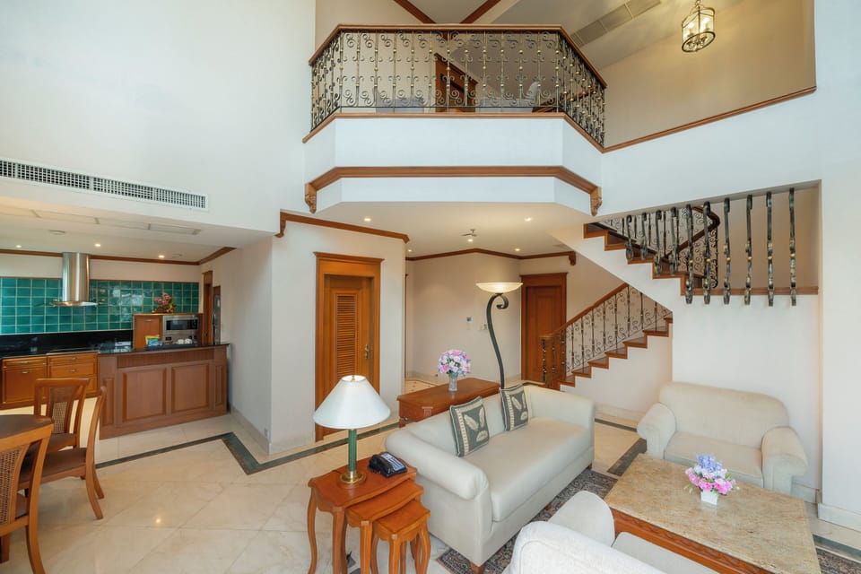 Penthouse Suite, 3 Bedroom | Living area | 32-inch LCD TV with cable channels, TV, pay movies