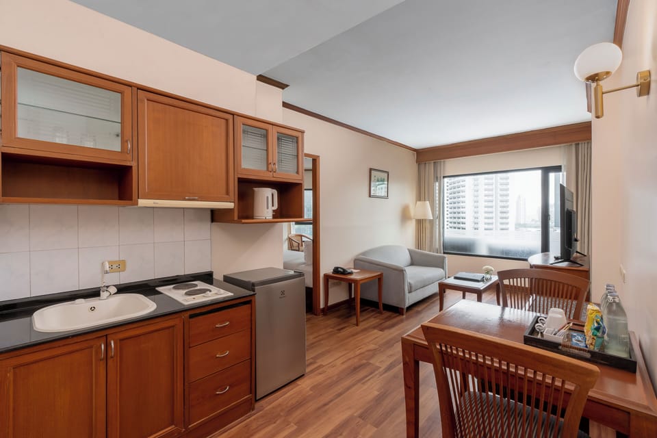 Junior Room, 1 Bedroom, Non Smoking | Living area | 32-inch LCD TV with cable channels, TV, pay movies