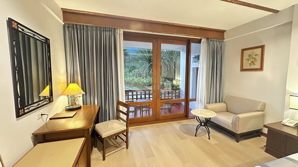 Deluxe Pool View | Free minibar items, in-room safe, desk, free WiFi