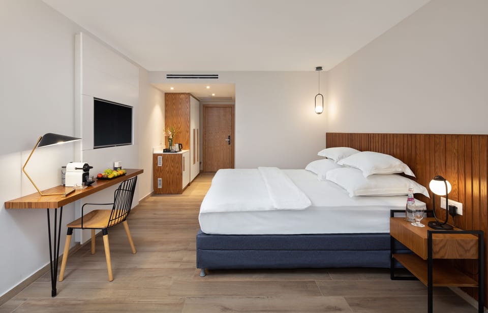 Superior Forest View | Minibar, in-room safe, desk, iron/ironing board