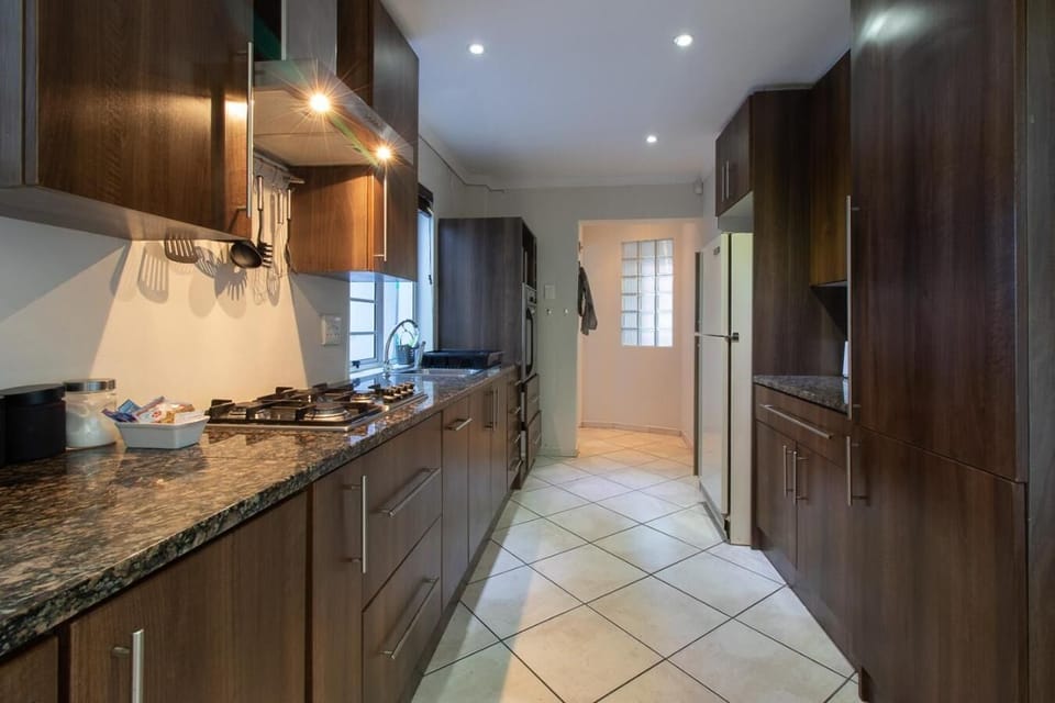 Fridge, stovetop, electric kettle, toaster