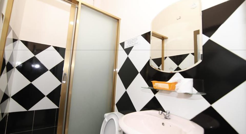 Shower, designer toiletries, hair dryer, slippers