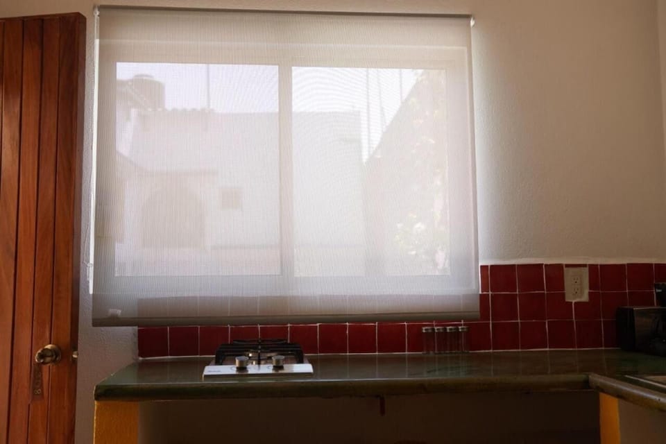 Junior Studio Suite | Private kitchen | Reusable coffee/tea filters, dining tables