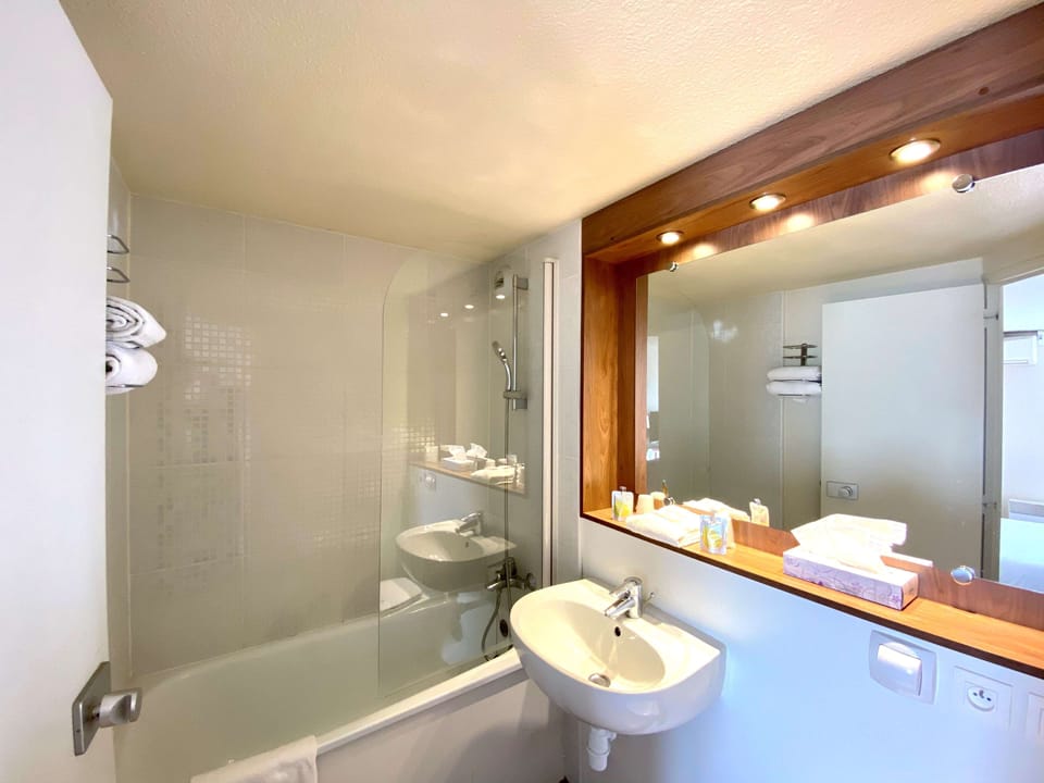 Shower, eco-friendly toiletries, hair dryer, towels