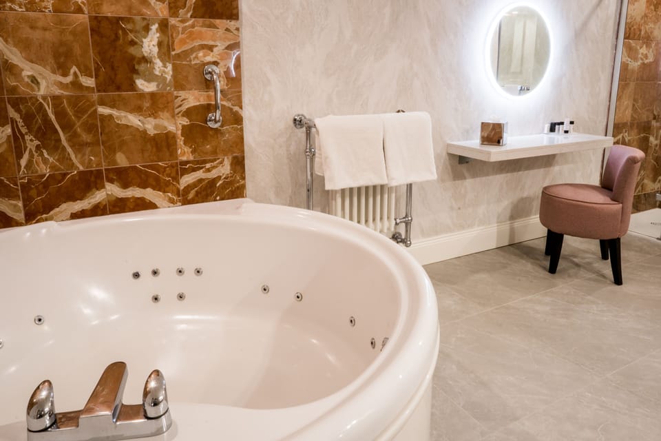 Separate tub and shower, free toiletries, hair dryer, bathrobes