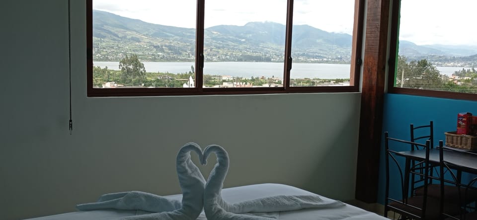 Superior Quadruple Room, Lake View | Down comforters, desk, soundproofing, iron/ironing board (on request)