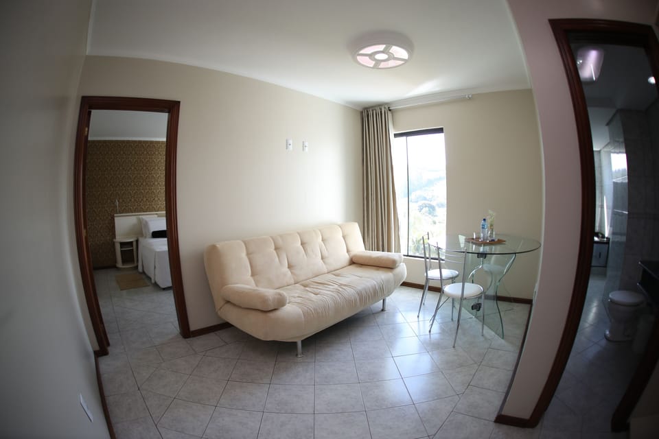 Premium Double Room | Living area | TV