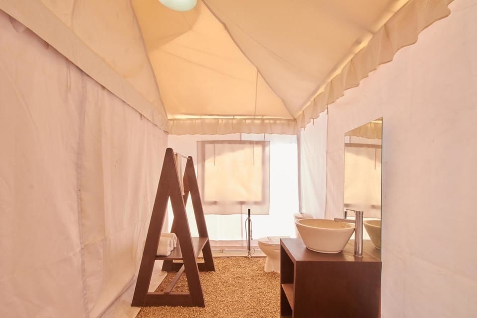 Premium Tent, 1 King Bed, Balcony, Resort View | Bathroom | Towels, soap, shampoo, toilet paper