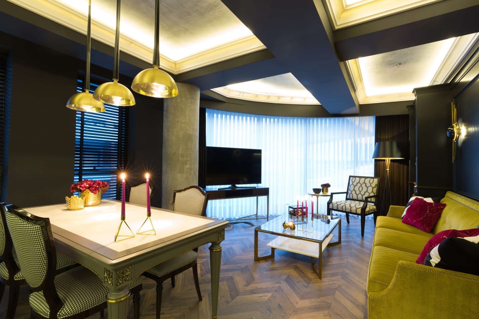 Suite, 1 Bedroom | Living area | LCD TV