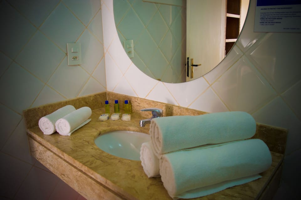 Standard Triple Room | Bathroom | Shower, free toiletries, towels, soap