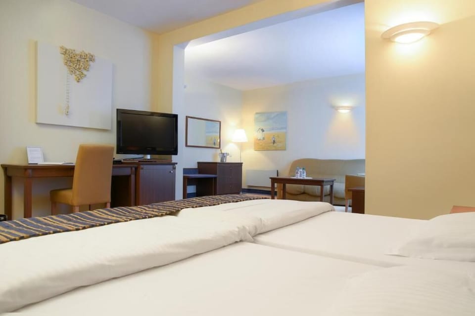 In-room safe, desk, laptop workspace, iron/ironing board