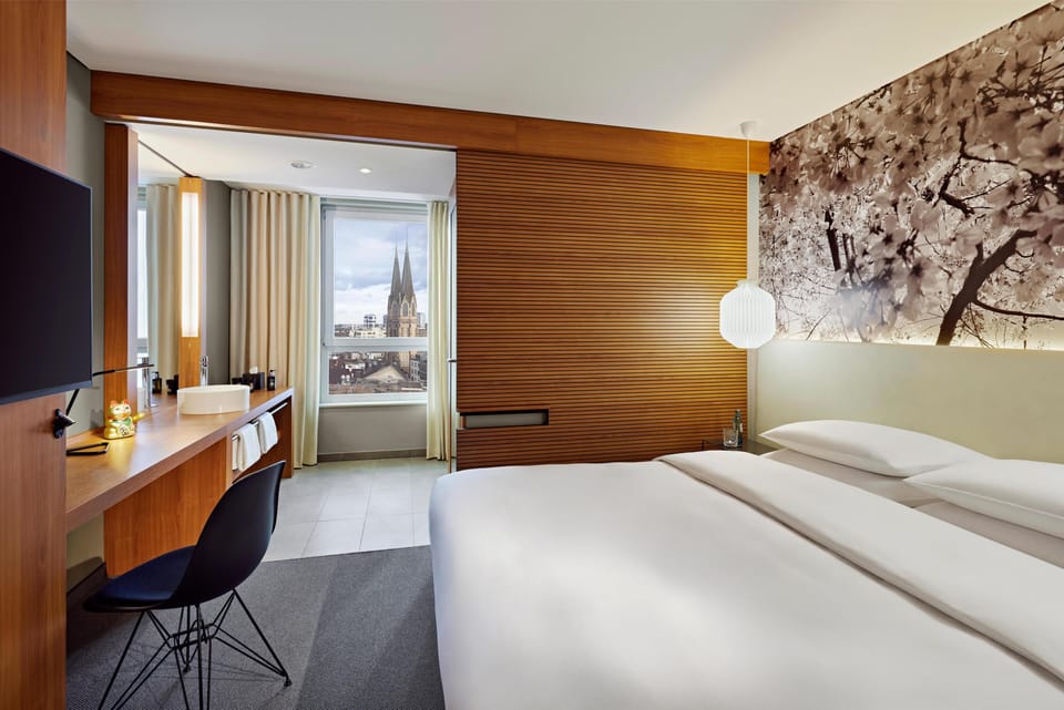 Room, 1 King Bed, City View | 1 bedroom, hypo-allergenic bedding, in-room safe, desk