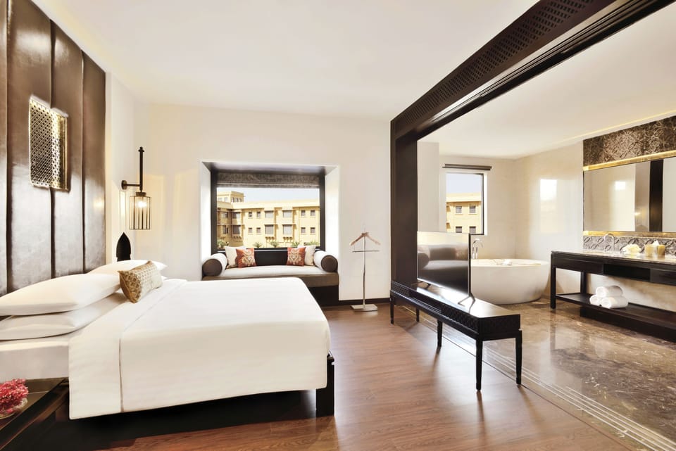 Premium bedding, down comforters, memory foam beds, minibar