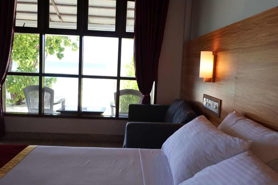Honeymoon Double Room, 1 King Bed, Sea View | Minibar, in-room safe, desk, laptop workspace