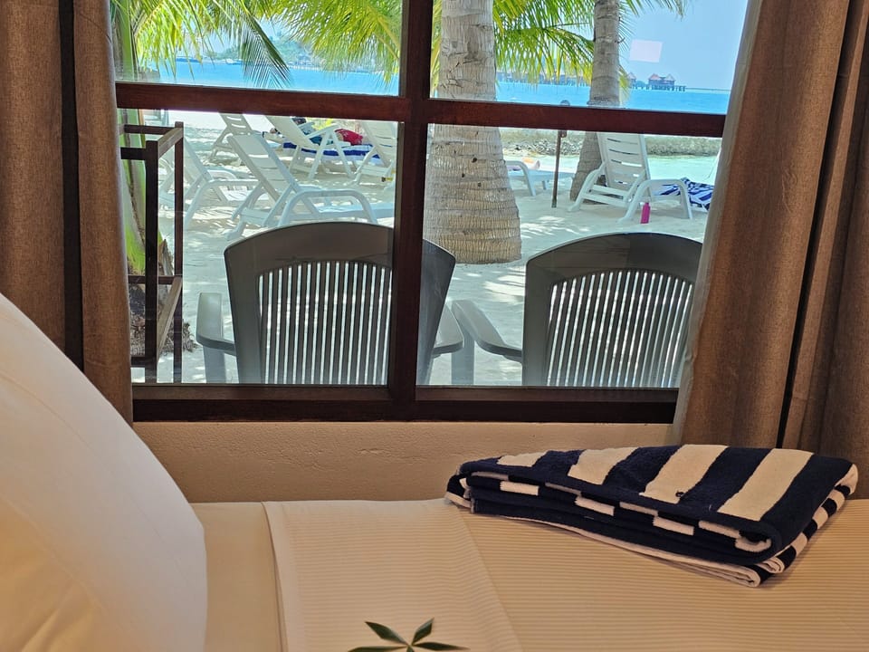 Deluxe Double or Twin Room, 1 Bedroom, Sea View | Minibar, in-room safe, desk, laptop workspace