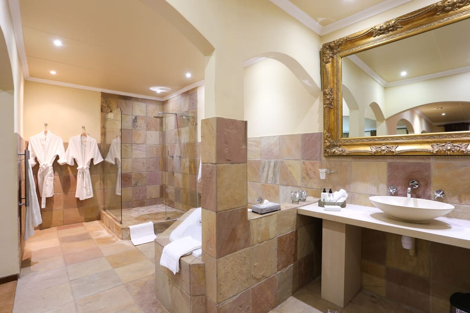 Separate tub and shower, deep soaking tub, free toiletries, hair dryer