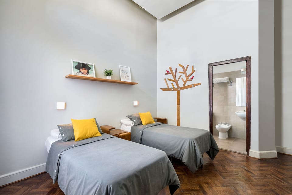 Twin Room, Private Bathroom | Blackout drapes, free WiFi, bed sheets
