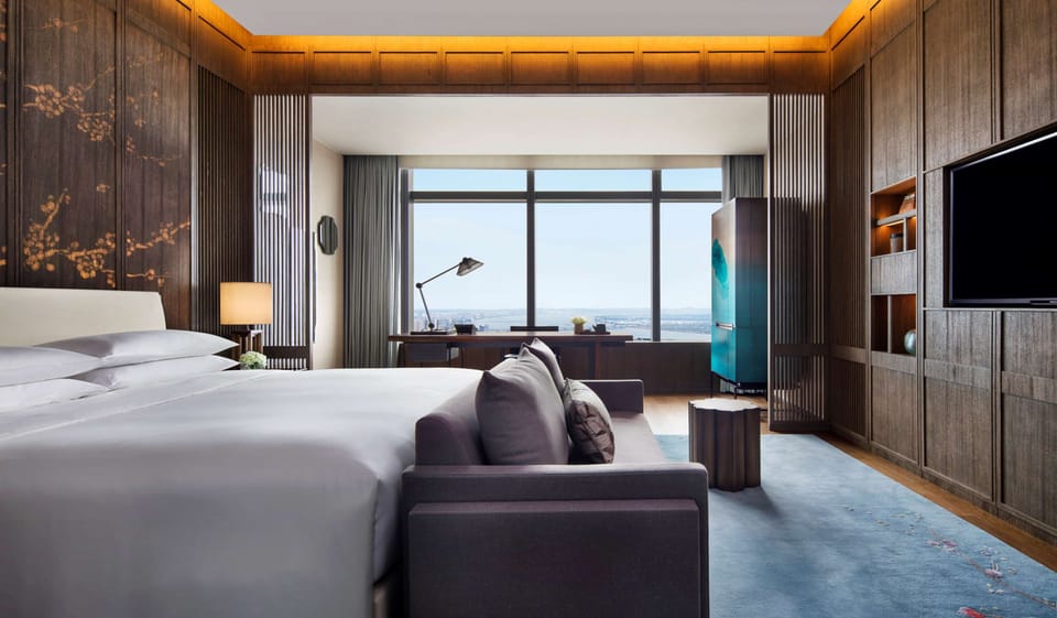 Room, 1 King Bed, River View | Premium bedding, minibar, in-room safe, desk