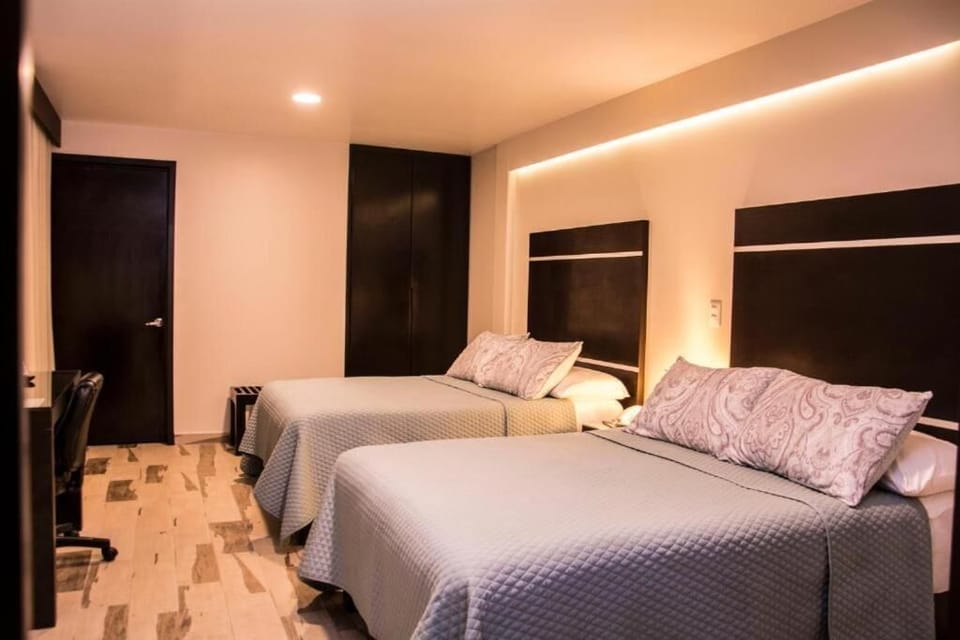 Comfort Quadruple Room, 2 Double Beds | In-room safe, desk, iron/ironing board, free WiFi