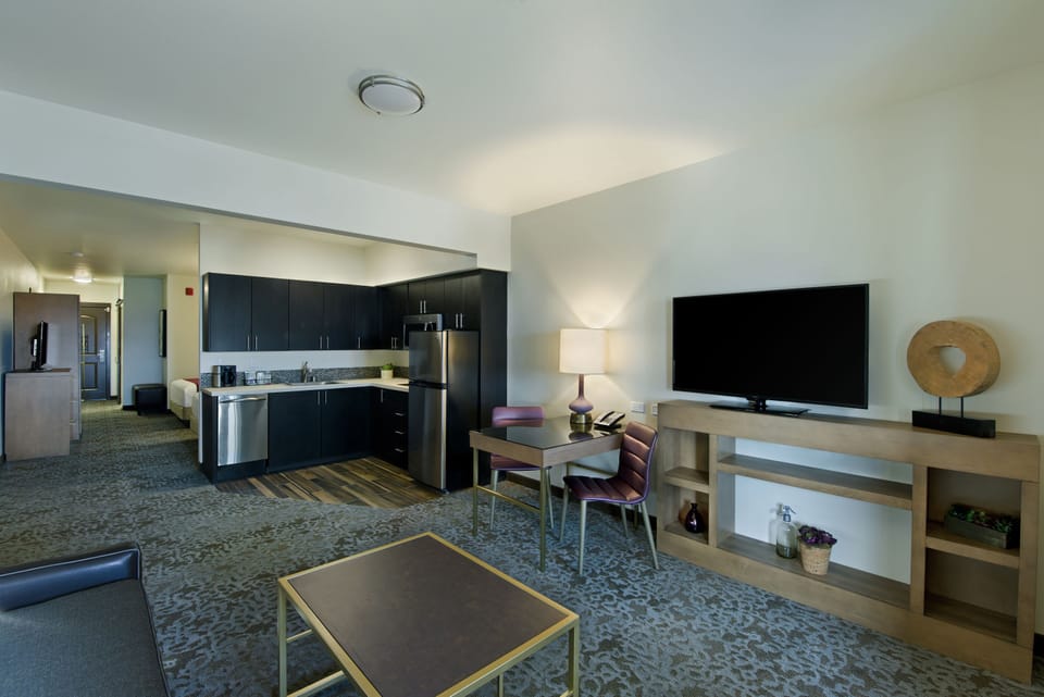 Extended Stay Balcony 2 Queen Suite Kitchenette | In-room safe, desk, laptop workspace, blackout drapes
