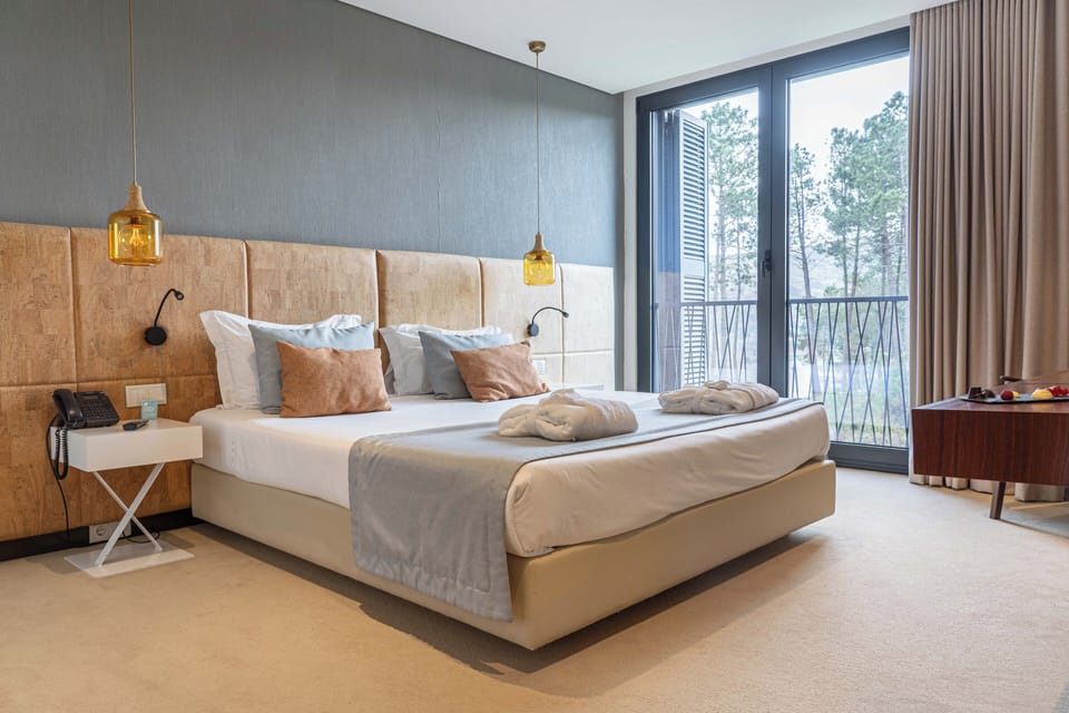 Comfort Double Room | Minibar, in-room safe, blackout drapes, soundproofing