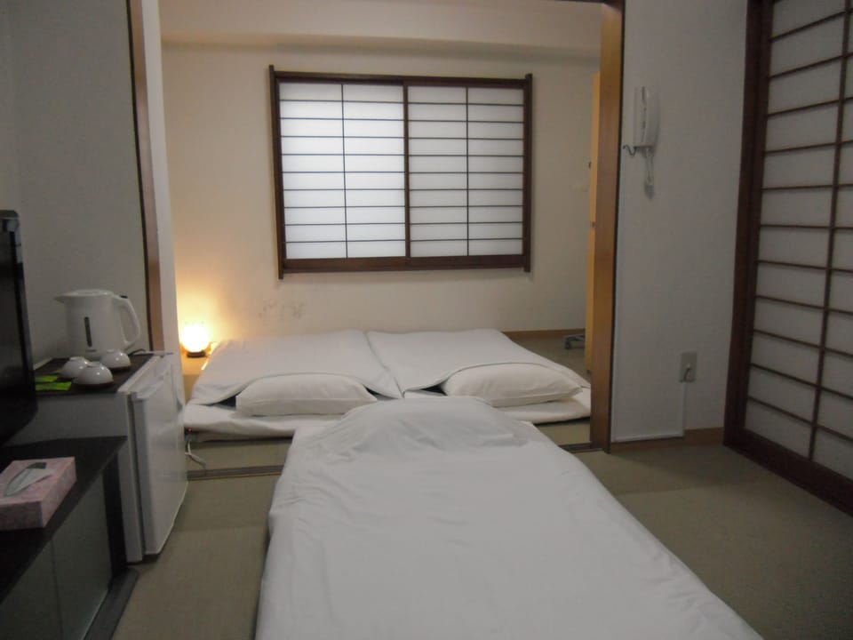 Standard Triple Room | Iron/ironing board, free WiFi, bed sheets