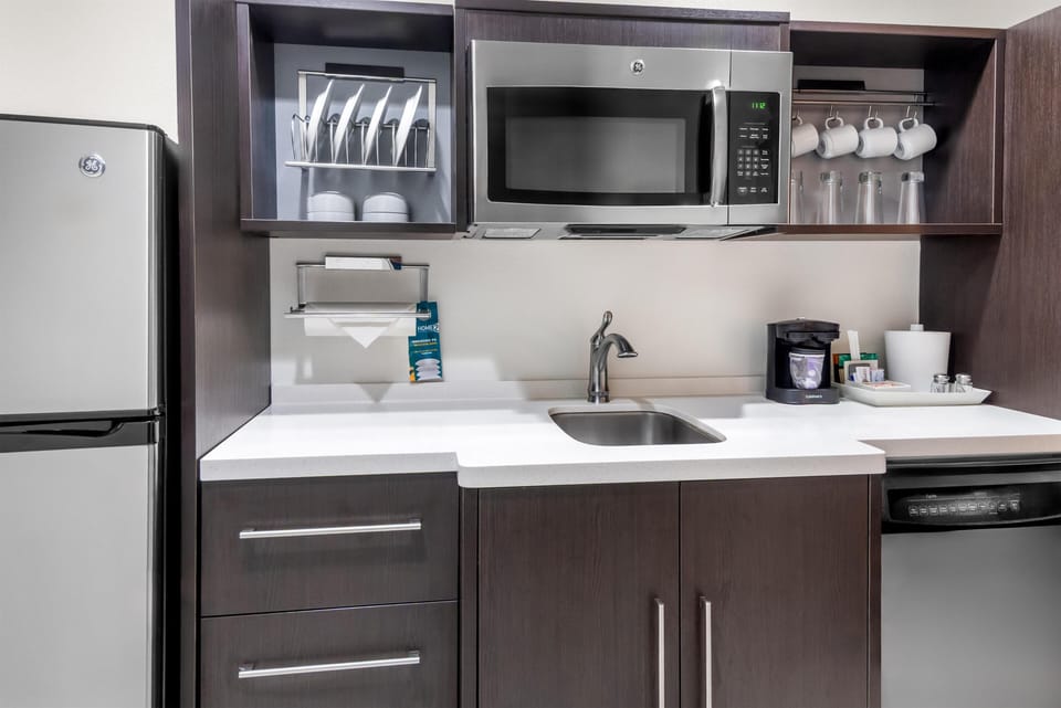 Studio Suite, 1 King Bed, Non Smoking | Private kitchen | Full-size fridge, microwave, oven, dishwasher