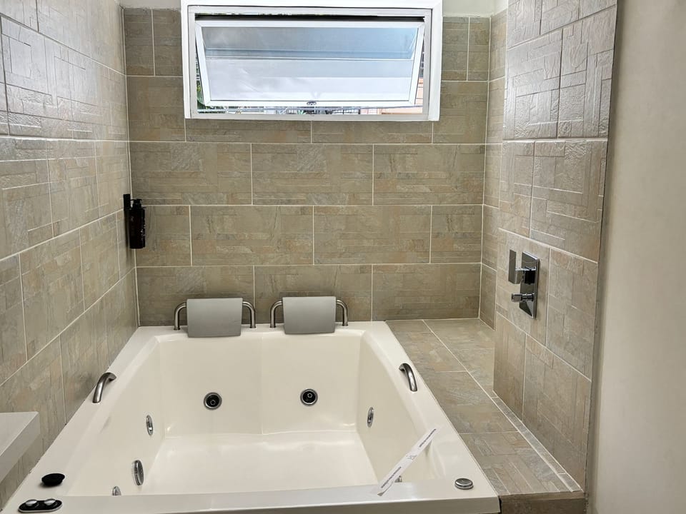Deluxe Room, Jetted Tub | In-room safe, desk, laptop workspace, soundproofing
