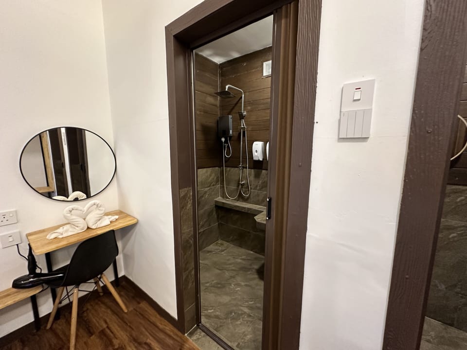 Deluxe Family Room | Bathroom | Hair dryer, bidet, towels, toilet paper