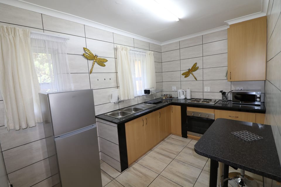 Family Double Room, Multiple Beds, Non Smoking, Garden View | Private kitchen | Full-size fridge, microwave, coffee/tea maker, electric kettle