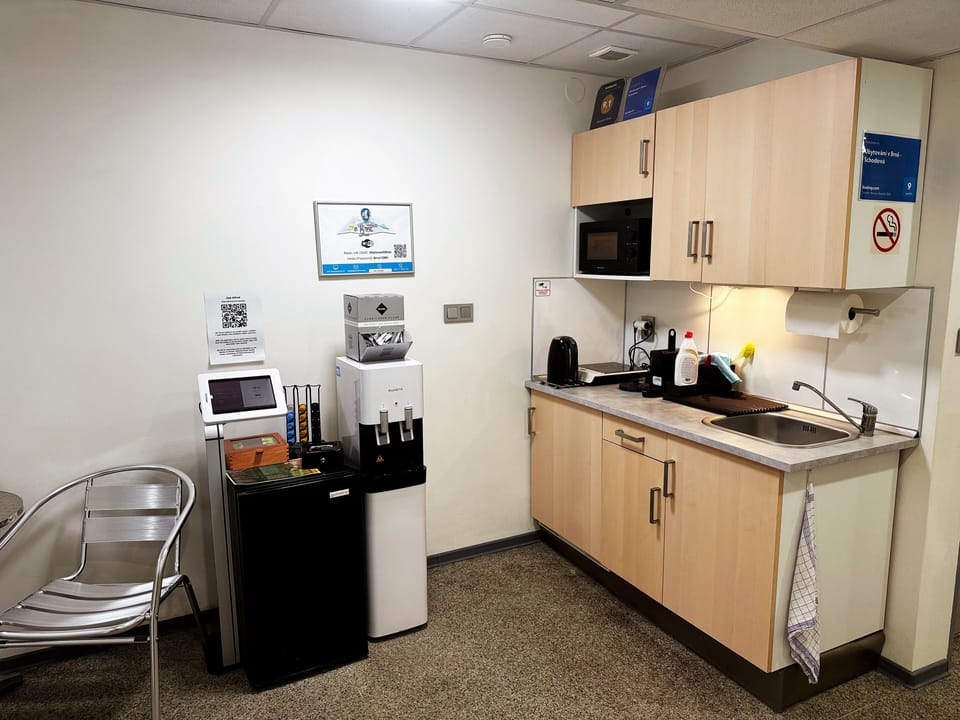 Shared fridge, microwave, espresso maker, coffee/tea maker