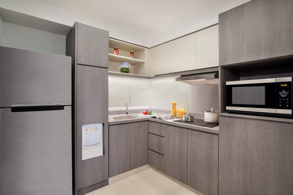 Executive Room, 2 Bedrooms | Private kitchen | Full-size fridge, electric kettle, cookware/dishes/utensils