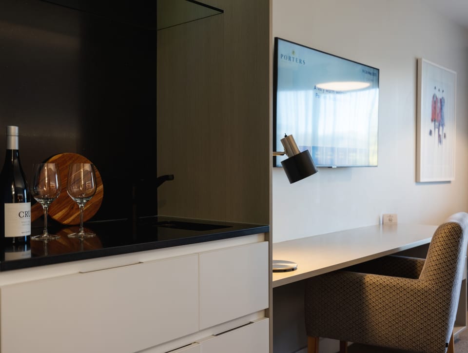 Premium bedding, desk, blackout drapes, soundproofing