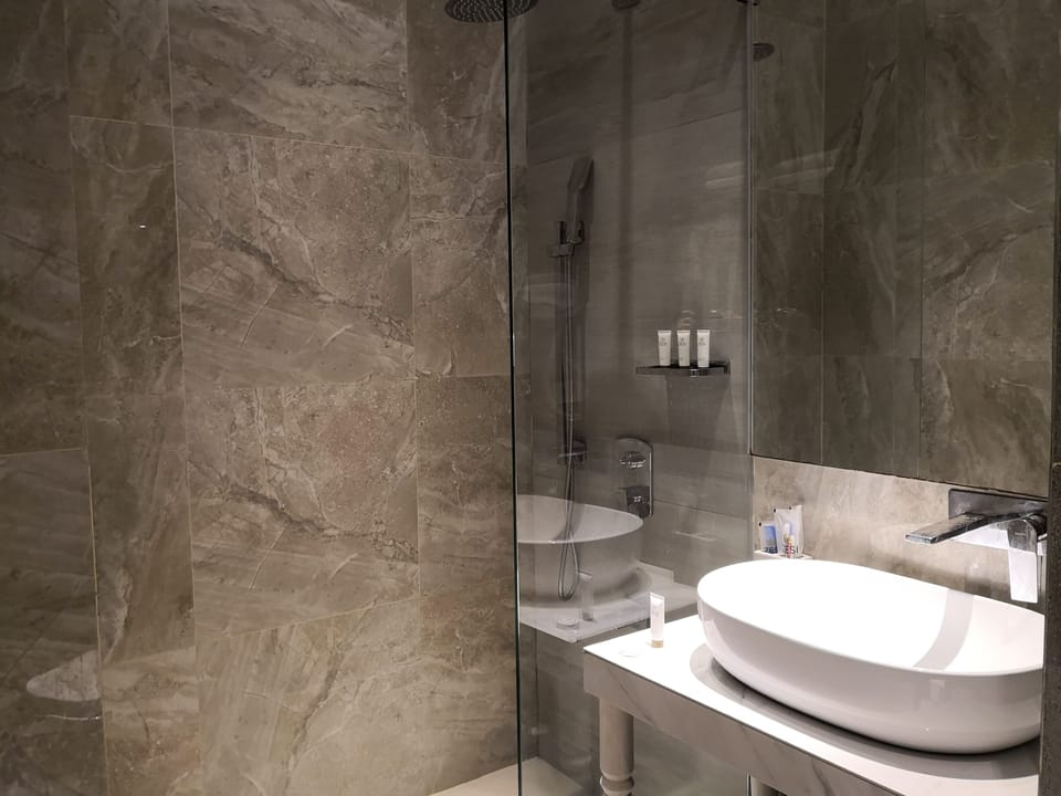 Shower, free toiletries, hair dryer, bathrobes