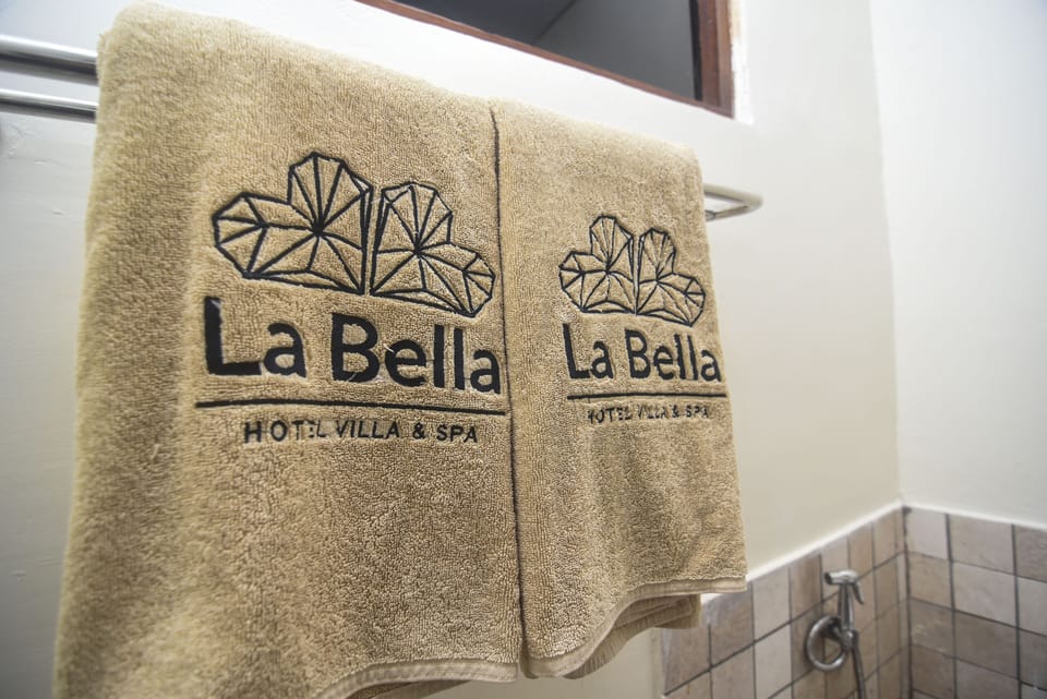 Suite Double Room Sharing Pool | Bathroom | Shower, rainfall showerhead, slippers, towels