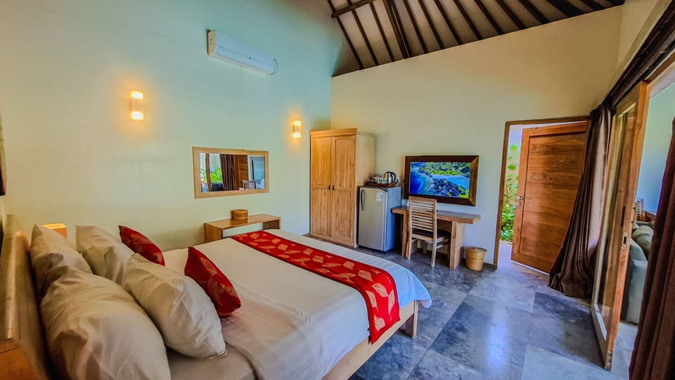 Romantic Villa, 1 Bedroom, Pool View | Minibar, in-room safe, desk, blackout drapes