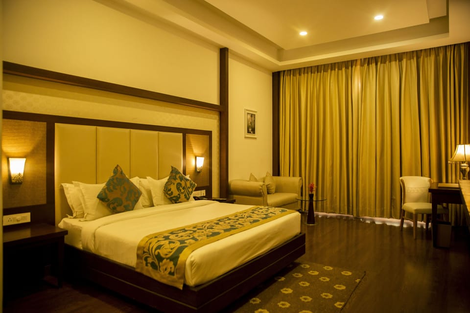 Fern Club Room | Premium bedding, down comforters, memory foam beds, in-room safe