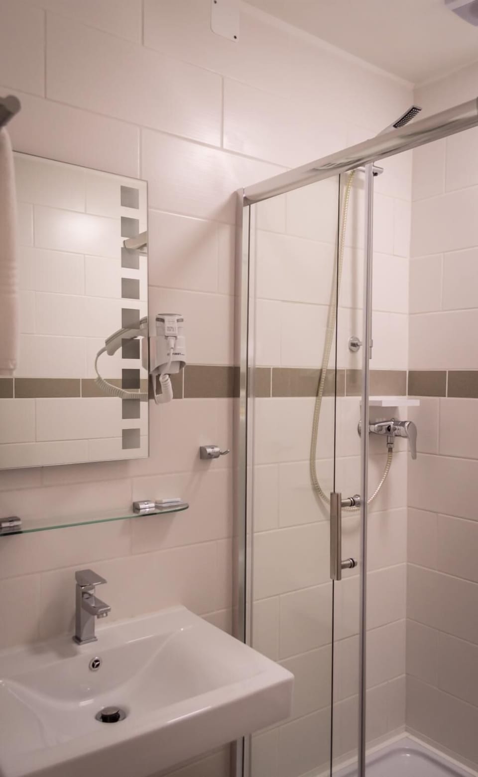 Shower, free toiletries, hair dryer, towels