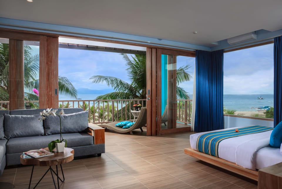 Suite, Beach View | Minibar, in-room safe, desk, free WiFi