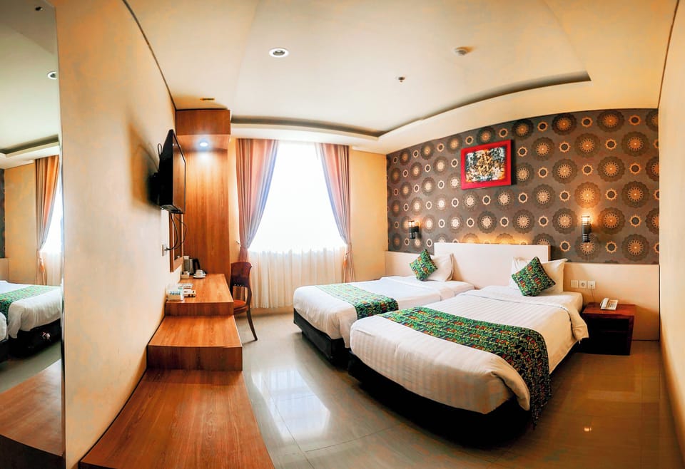 Premium bedding, desk, rollaway beds (surcharge), WiFi (free)