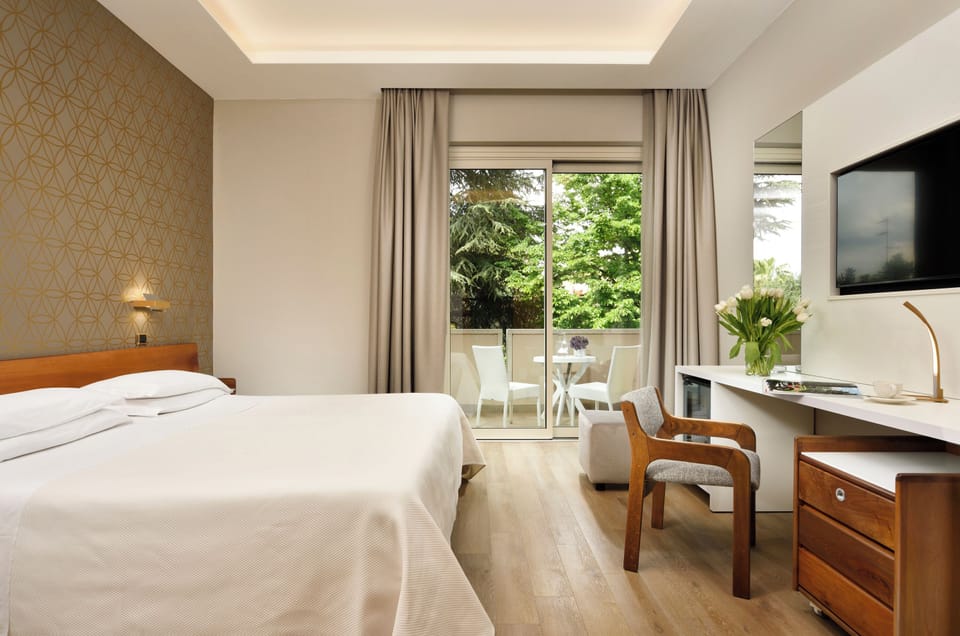 Standard Double or Twin Room, City View | Minibar, in-room safe, individually furnished, desk
