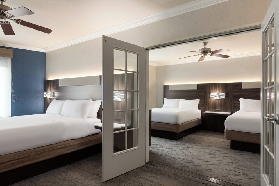 Suite, Multiple Beds | Premium bedding, desk, blackout drapes, iron/ironing board