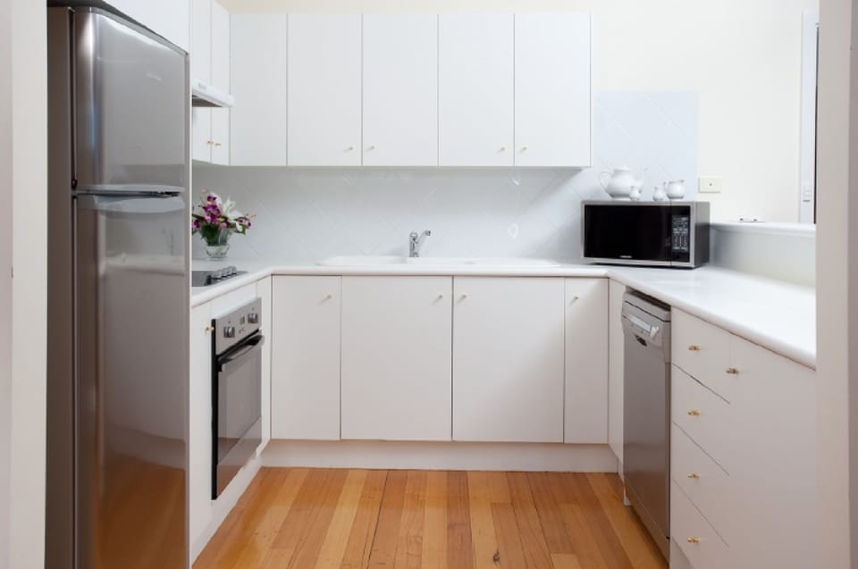 Fridge, coffee/tea maker, electric kettle, cookware/dishes/utensils