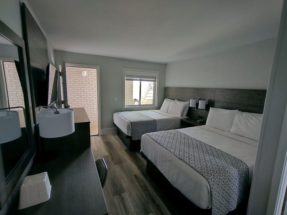 Standard Double Room, 2 Double Beds | Blackout drapes, WiFi (free), bed sheets