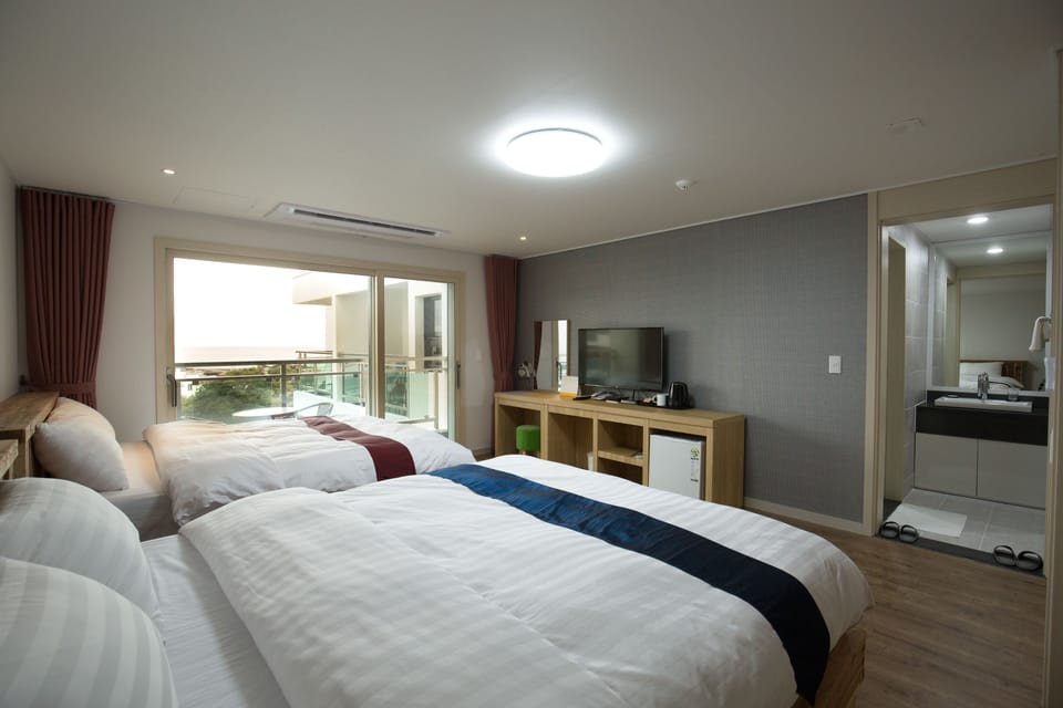 Family Twin Room, City View | Memory foam beds, blackout drapes, soundproofing, free WiFi
