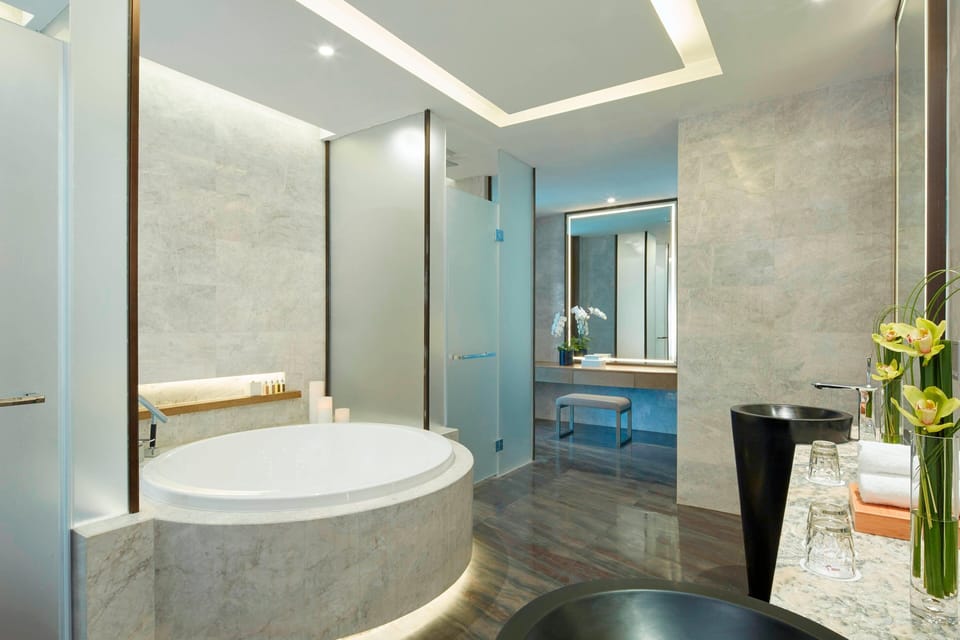 Room, 1 King Bed | Bathroom | Separate tub and shower, free toiletries, hair dryer, bathrobes