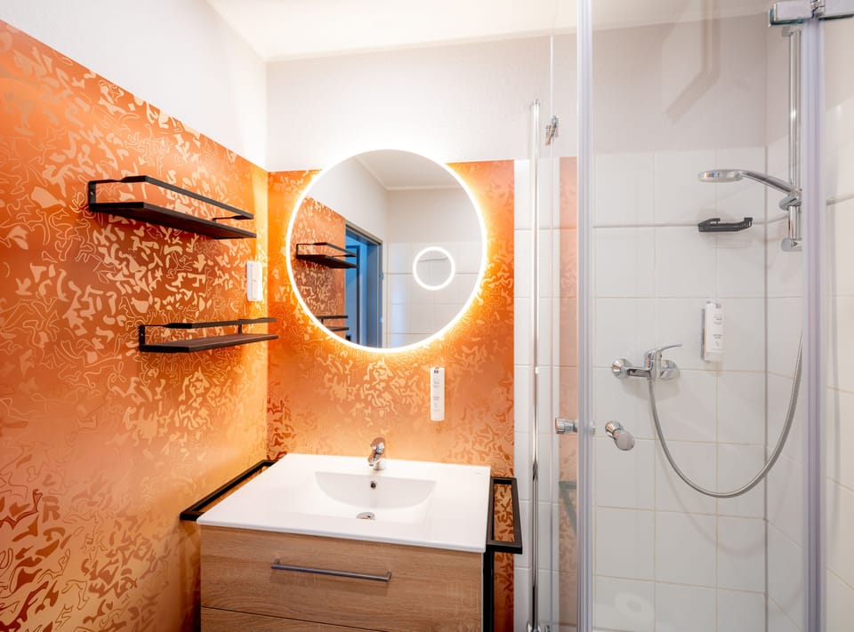 Shower, free toiletries, hair dryer, towels