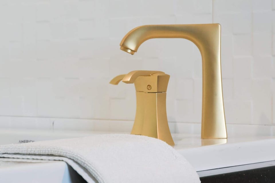Premium bedding, desk, laptop workspace, iron/ironing board
