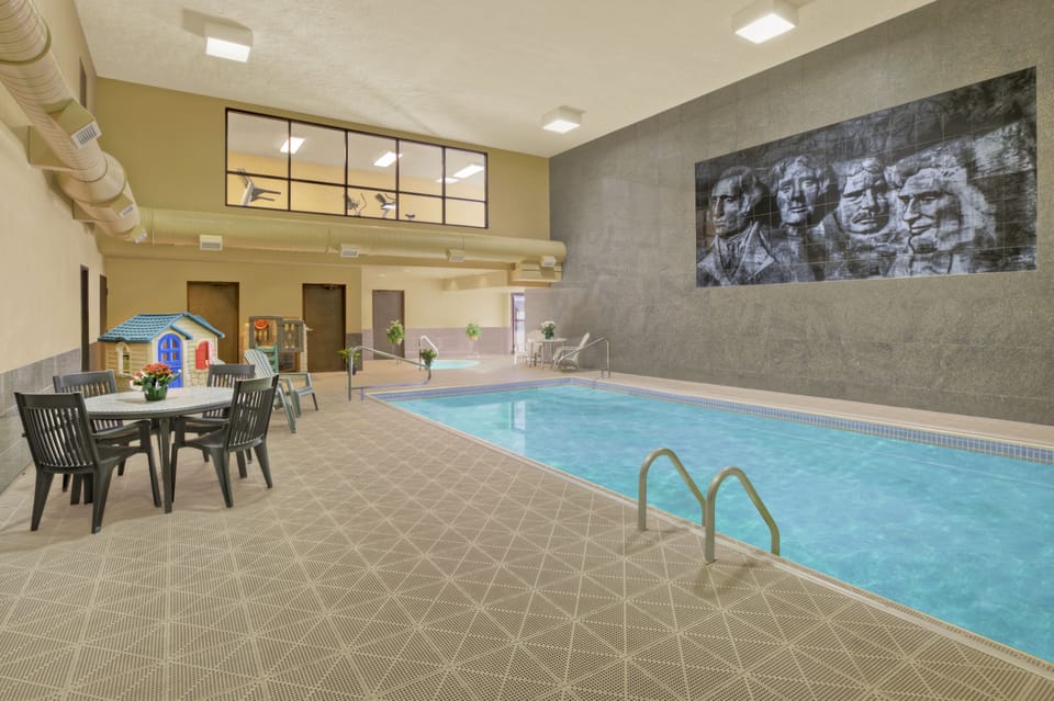 Indoor pool, open 8 AM to 10 PM, sun loungers
